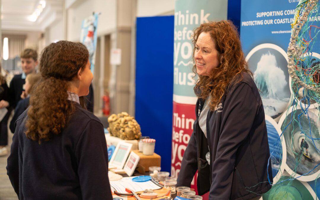 Clean Coasts supported by Uisce Éireann meet students at the Green Schools National Marine Environment Conference urging them to Think Before You Flush and Pour